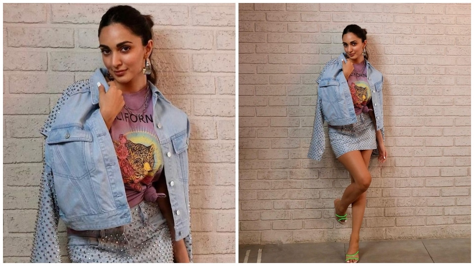 Kiara Advani is dressed to chill in a denim mini skirt and printed top. Kiara Advani is dressed to chill in a denim mini skirt and printed top. 