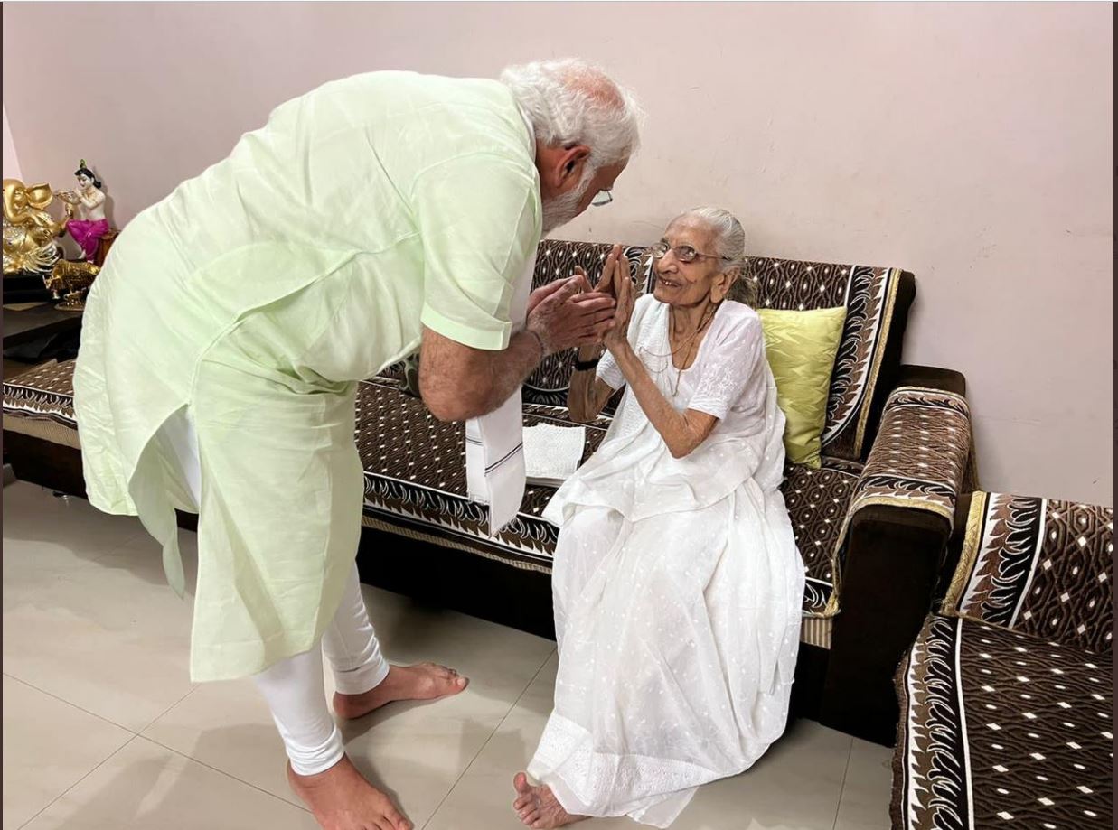 PM Narendra Modi meets his mother Heeraben Modi at her residence in Gandhinagar in Gujarat. (ANI Photo)