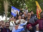 AAP supporters celebrating in Amritsar on Thursday. (HT)
