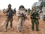 NATO troops pose for a photo prior to military exercises in Adazi Military base in Kadaga, Latvia. NATO troops pose for a photo prior to military exercises in Adazi Military base in Kadaga, Latvia.