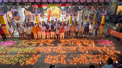 BJP workers light lamps to celebrate the party's victory in the Uttar Pradesh, Uttarakhand, Goa and Manipur assembly elections, in Bhopal on Friday. (PTI) BJP workers light lamps to celebrate the party's victory in the Uttar Pradesh, Uttarakhand, Goa and Manipur assembly elections, in Bhopal on Friday. (PTI)