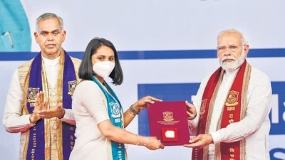Prime Minister Narendra Modi presents degrees to students during the first convocation of Rashtriya Raksha University at Lavad, in Gandhinagar on Saturday. (PTI)