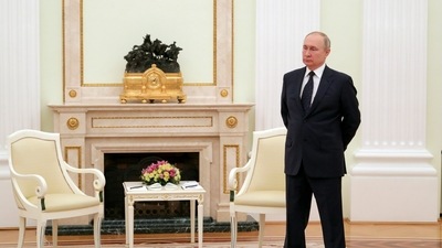 Russian President Vladimir Putin stands while waiting for Belarusian President Alexander Lukashenko prior to their talks in Moscow, Russia, Friday. (AP) Russian President Vladimir Putin stands while waiting for Belarusian President Alexander Lukashenko prior to their talks in Moscow, Russia, Friday. (AP)