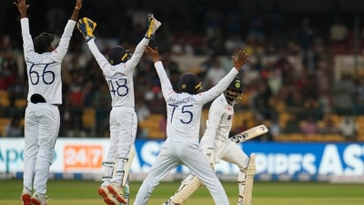 Sri Lankan players appeal unsuccessfully for the wicket of India's Jasprit Bumrah, right, during the first day of the second cricket test match between India and Sri Lanka in Bengaluru, India, Saturday, March 12, 2022 (AP) Sri Lankan players appeal unsuccessfully for the wicket of India's Jasprit Bumrah, right, during the first day of the second cricket test match between India and Sri Lanka in Bengaluru, India, Saturday, March 12, 2022 (AP)