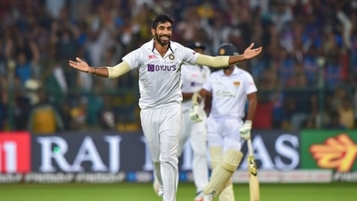 India's Jasprit Bumrah celebrates the wicket of Sri Lanka's Kusal Mendis during the first day of 2nd test cricket match between India and Sri Lanka at Chinnaswamy Stadium, in Bengaluru, Saturday, March 12, 2022. (PTI) India's Jasprit Bumrah celebrates the wicket of Sri Lanka's Kusal Mendis during the first day of 2nd test cricket match between India and Sri Lanka at Chinnaswamy Stadium, in Bengaluru, Saturday, March 12, 2022. (PTI)