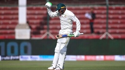 Australia's Usman Khawaja jumps to celebrate his century during the 1st day of the second test match between Pakistan and Australia at the National Stadium in Karachi, Pakistan, Saturday, March 12, 2022 (AP) Australia's Usman Khawaja jumps to celebrate his century during the 1st day of the second test match between Pakistan and Australia at the National Stadium in Karachi, Pakistan, Saturday, March 12, 2022 (AP)