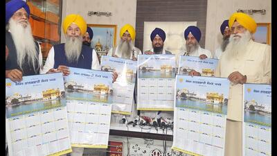 Akal Takht jathedar Giani Harpreet Singh with SGPC members releasing the Nanakshahi calendar in Amritsar on Saturday. (Sameer Sehgal/HT)