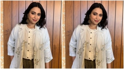 Swara added more sass to her look with a white long full-sleeved shrug with floral patterns. (Instagram/@reallyswara)