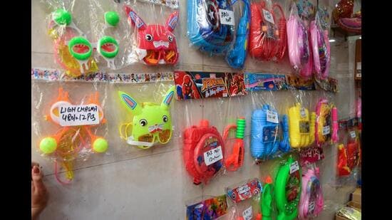 Make Holi fun for your kids with these funky glasses available at ₹480 for a set of 12 pieces (Photo: Manish Rajput/HT)