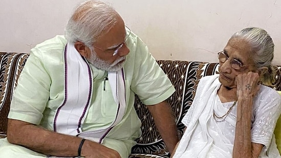 PM Modi began his two-day visit to Gujarat on March 11. After completing his engagements for the day, he met his nonagenarian mother and his brother Pankaj Modi at their house in Vrindavan society in Raysan area on the outskirts of Gandhinagar.(ANI)