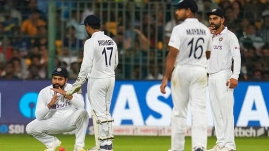 India's captain Rohit Sharma, left, gestures to ask for a review for the wicket of Sri Lanka's Dhananjaya de Silva during the first day of the second cricket test match between India and Sri Lanka in Bengaluru, India, Saturday, March 12, 2022(AP)