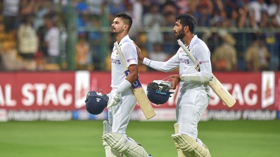 India's batter Shreyas Iyer being patted on the back by teammate Jasprit Bumrah as he misses scoring a century during the first day of 2nd test cricket match between India and Sri Lanka at Chinnaswamy Stadium, in Bengaluru, Saturday, March 12(PTI)