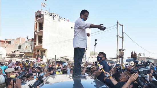 New Delhi, India – March 12, 2022: Delhi CM Arvind Kejriwal addresses the residents after a fire broke out at a slum in Gokulpuri, New Delhi, India, on Saturday, March 12, 2022. (Photo by Amal KS/Hindustan Times)