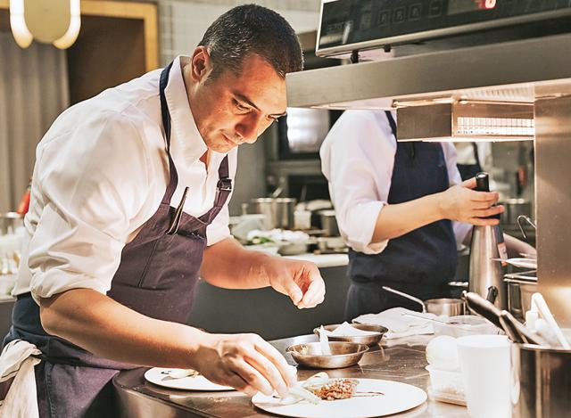 At Odette, servers, managers and even chef Julien Royer, check on each table throughout the meal