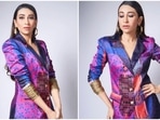 The Kapoor sisters, Karisma Kapoor and Kareena Kapoor Khan, have a very unique styling sense. From basic wears to fancy designer outfits, the duo sure knows how to ace every outfit they don. Karisma, who has won hearts of many with her beauty and acting, recently treated her fans with jaw-dropping photos of herself in a multi-coloured Manish Malhotra pantsuit.(Instgaram/@therealkarismakapoor)