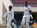 West Indies' Nkrumah Bonner and Jason Holder after the match.