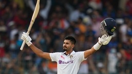 Shreyas Iyer celebrates scoring fifty runs during the first day of the second cricket test match between India and Sri Lanka in Bengaluru, India, Saturday