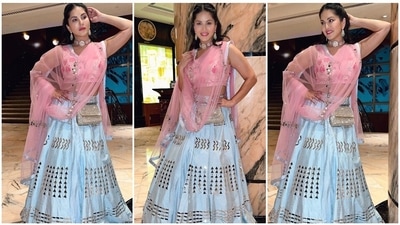 Sunny Leone manages to make heads turn every time she steps out of her house in trendy outfits. The actor has a huge fan following and she makes sure to treat them with all her doings. She has flooded her Instagram handle with photos and videos of her photoshoot stills. In her latest post, the One Night Stand actor can be seen going all desi in a blue lehenga teamed with bright pink organza duppata. (Instagram/@sunnyleone) Sunny Leone manages to make heads turn every time she steps out of her house in trendy outfits. The actor has a huge fan following and she makes sure to treat them with all her doings. She has flooded her Instagram handle with photos and videos of her photoshoot stills. In her latest post, the One Night Stand actor can be seen going all desi in a blue lehenga teamed with bright pink organza duppata. (Instagram/@sunnyleone)