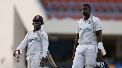 West Indies' Nkrumah Bonner and Jason Holder after the match. (Action Images via Reuters)