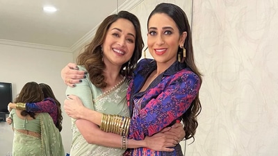 Madhuri Dixit held Karisma Kapoor in a new picture. Madhuri Dixit held Karisma Kapoor in a new picture.