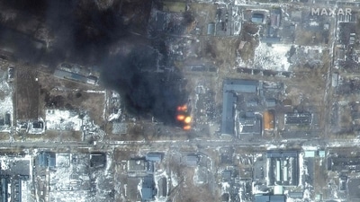This Maxar satellite image taken and released shows a multispectral view of fires in an industrial area of the Primorskyi district in western Mariupol, Ukraine. (AFP) This Maxar satellite image taken and released shows a multispectral view of fires in an industrial area of the Primorskyi district in western Mariupol, Ukraine. (AFP)