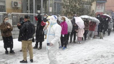 Residents line up for coronavirus screening during a lockdown in Changchun in northeastern China’s Jilin province on Saturday. (AP) Residents line up for coronavirus screening during a lockdown in Changchun in northeastern China’s Jilin province on Saturday. (AP)