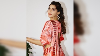 Jacqueline Fernandez ditched dresses and gowns for this beautiful orange printed contemporary saree. (Instagram/@jacquelinef143) Jacqueline Fernandez ditched dresses and gowns for this beautiful orange printed contemporary saree. (Instagram/@jacquelinef143)