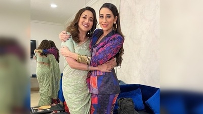Karisma Kapoor shared another photo on her Instagram handle where she can be seen hugging and posing with actor Madhuri Dixit. (Instagram/@therealkarismakapoor) Karisma Kapoor shared another photo on her Instagram handle where she can be seen hugging and posing with actor Madhuri Dixit. (Instagram/@therealkarismakapoor)