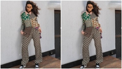 Shibani's shirt came with collar details and multicoloured floral patterns. Shibani's trousers came intricately detailed in blue, maroon and yellow ochre floral prints. (Instagram/@shibanidandekar)