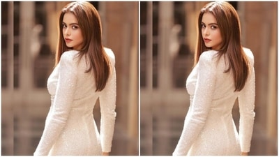 Aamna played muse to the fashion designer house Nadine Merabi and picked an ivory-white sequined short dress for the pictures. (Instagram/@aamnasharifofficial)