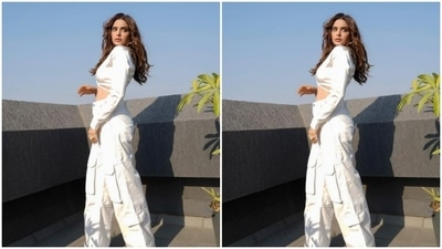 In nude eyeshadow, black eyeliner, mascara-laden eyelashes, drawn eyebrows, contoured cheeks, a shade of nude lipstick and silver hoop earrings, Aamna brought fashion traffic to a standstill. (Instagram/@aamnasharifofficial)
