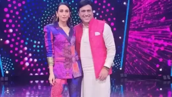 Karisma Kapoor poses with Govinda on the sets of India's Got Talent Season 9.(HT File Photo)