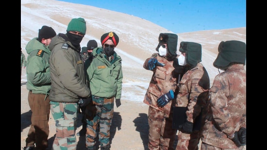 In this photograph provided by the Indian Army, army officers of India and China hold a meeting at Pangong lake region in Ladakh on the India-China border on February. 10, 2021 (AP)