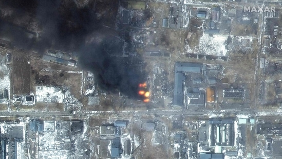 This Maxar satellite image taken and released shows a multispectral view of fires in an industrial area of the Primorskyi district in western Mariupol, Ukraine.(AFP)