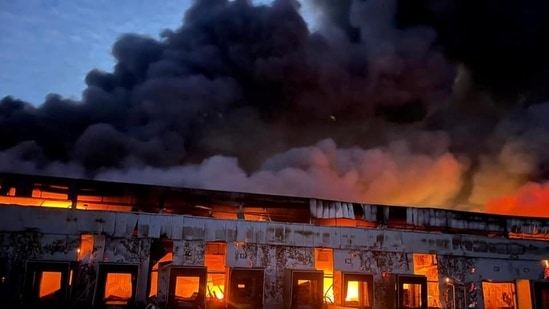 A warehouse storing frozen products is seen on fire after shelling, as Russia's attack on Ukraine continues, (file photo)&nbsp;