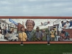 Michael Rosato's mural "Reflections on Pine" is centered around Tubman Michael Rosato's mural "Reflections on Pine" is centered around Tubman