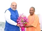 Union home minister Amit Shah with Uttar Pradesh chief minister-designate Yogi Adityanath in New Delhi(Twitter/Yogi Adityanath) Union home minister Amit Shah with Uttar Pradesh chief minister-designate Yogi Adityanath in New Delhi(Twitter/Yogi Adityanath)