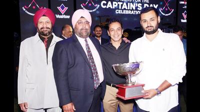 (From left to right) Chandigarh Golf Club vice-president Dr GS Kochhar, president Ravibir Singh, captain of the course Arvind Bajaj with the winner Raghav Bhandari. (HT Photo)