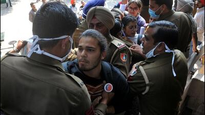 Students engaging in heated argument with police during the protest over hostel allotment at Students Centre in Panjab University on Monday. (Ravi Kumar/HT)