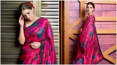 Kriti Sanon also wore a pink floral saree teamed with a tying backless blouse and accessorised with fresh red roses on her hair to one of the promotional events of Bachchhan Paandey. (Instagram/@kritisanon) Kriti Sanon also wore a pink floral saree teamed with a tying backless blouse and accessorised with fresh red roses on her hair to one of the promotional events of Bachchhan Paandey. (Instagram/@kritisanon)
