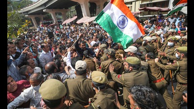 Daily wagers of the Public Health Engineering Employees United Front being stopped by the police while marching towards Raj Bhawan on Monday. (PTI) Daily wagers of the Public Health Engineering Employees United Front being stopped by the police while marching towards Raj Bhawan on Monday. (PTI)