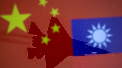 Taiwan again warns Chinese aircraft in its air defence zone.