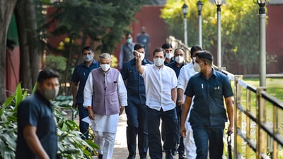 Congress leader Rahul Gandhi arrives to attend the Congress Working Committee meeting after losses in the recent assembly elections in five states, at the AICC headquarters in New Delhi. (PTI)