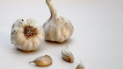 Garlic: Selenium, an enzyme found in garlic helps one to enhance sperm motility. (Unsplash) Garlic: Selenium, an enzyme found in garlic helps one to enhance sperm motility. (Unsplash)