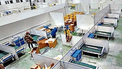 Workers convert an exhibition centre into a makeshift hospital in Changchun. (PTI) Workers convert an exhibition centre into a makeshift hospital in Changchun. (PTI)
