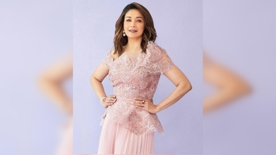 Madhuri Dixit's outfit is comprised of mesh top and flared pleated pants. (Instagram/@madhuridixitnene)