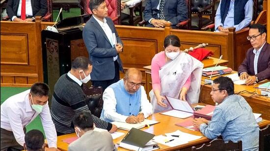 Manipur Chief Minister-designate N Biren Singh takes oath as a member of the 12th State Legislative Assembly at the Assembly Hall in Imphal on Monday. (ANI PHOTO.)