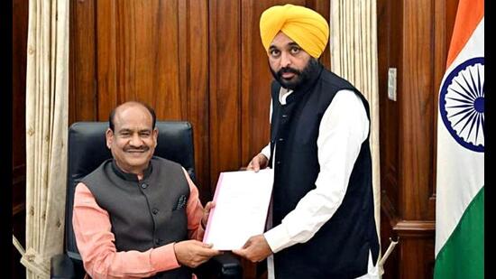 Punjab CM-designate Bhagwant Mann handing over his resignation from the membership of the Lok Sabha to Speaker Om Birla in New Delhi on Monday. (ANI Photo)