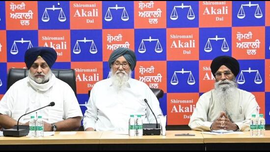 Former Punjab chief minister Parkash Singh Badal with Shiromani Akali Dal president Sukhbir Singh Badal at the party’s core committee meeting in Chandigarh on Monday. (Keshav Singh/HT)