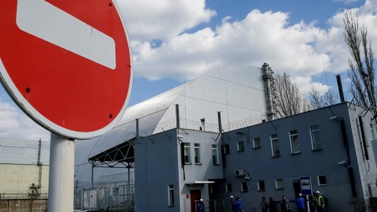 File photo of a New Safe Confinement structure over the old sarcophagus covering the damaged fourth reactor at the Chernobyl nuclear power plant.(REUTERS)